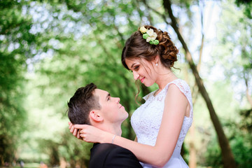 nice portrait of young and beautiful bride and groom