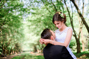 nice portrait of young and beautiful bride and groom