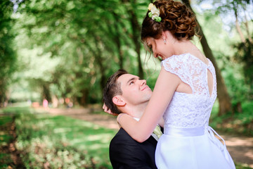 nice portrait of young and beautiful bride and groom