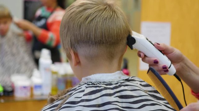 child's haircut at the Barber shop