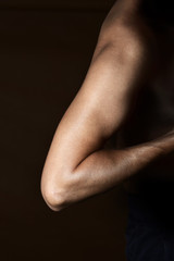 Fototapeta na wymiar nude arm of a young man