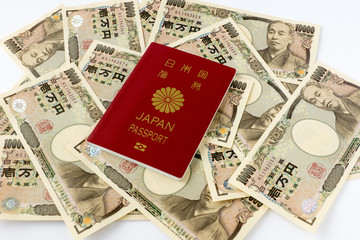 Japanese passport and ten thousand yen bills