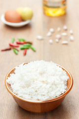 cooked rice on wood table