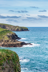 Fototapeta na wymiar Picturesque coastline of Cornwall, the UK's most westerly county. This peninsula is largely surrounded by the North Atlantic and the entrance to the English Channel to the south.