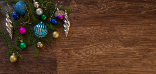 Fototapeta na wymiar New Year tree decorations wooden background