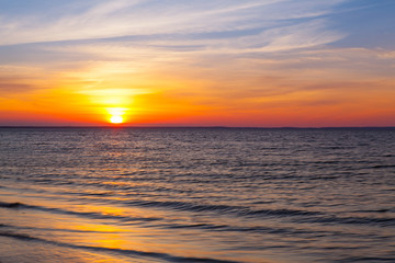 Naklejka na ściany i meble Stunning sunset on the empty beach, Cape Cod, USA