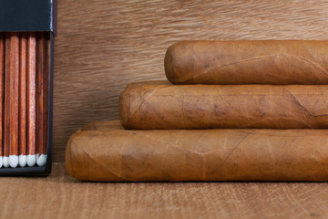 Luxury Cuban cigars  on the wooden desk