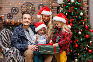 Family , children in Christmas room