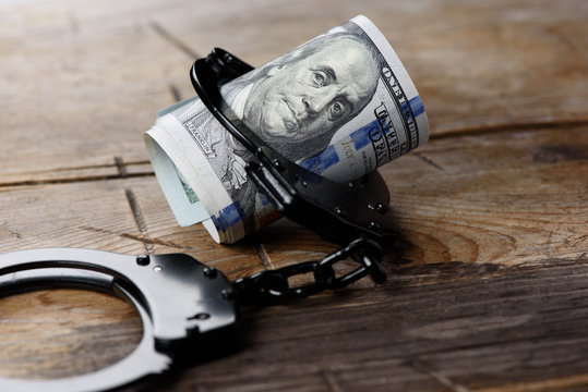 Money in handcuffs. Security concept