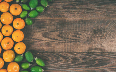 Exotic fruits on wooden background