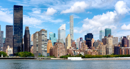 Fototapeta na wymiar Old apartment buildings and modern skyscrapers in midtown Manhattan , New York City