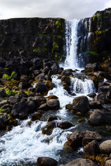 rocky icelandic landscape with a waterfall