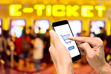 One using smartphone for booking movie ticket