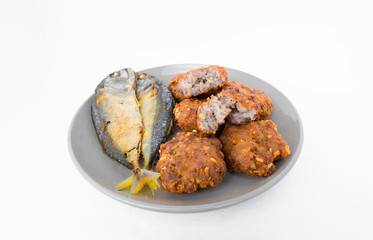 Thailand food, fish, pork, mixed with garlic, pepper, fried.