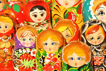 Fototapeta na wymiar Russian souvenirs. Russian wooden nesting dolls matryoshkas are displayed at a souvenirs market in Saint Petersburg 