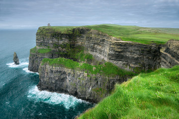 Spectacular view of famous Cliffs of Moher and wild Atlantic Ocean, County Clare, Ireland.
