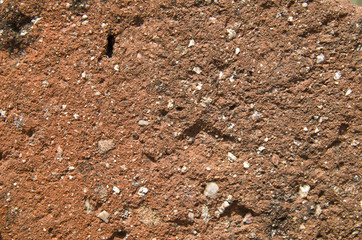 Old brick with stones closeup