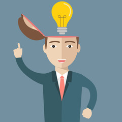 Big idea concept with man and lightbulb. Symbol of having an idea with businessman pointing at light bulb
