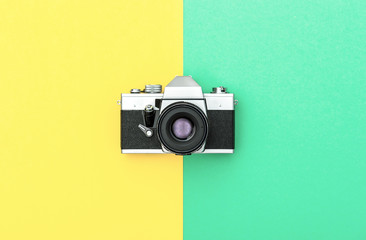Fototapeta premium Vintage camera color background Retro style Minimalistic