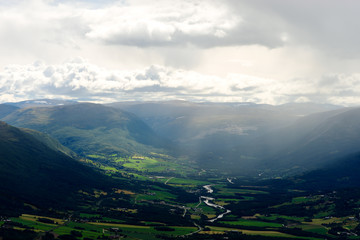 Raining in Oppdal mountain valley landscape background