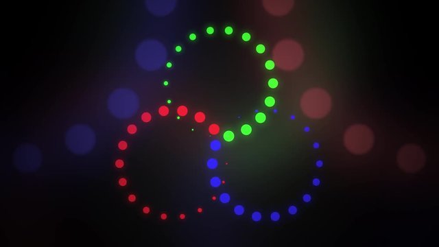 Astract red, green and blue rotating cirles motion background. GRB, LED or color blending concepts. 4K seamless loop animation