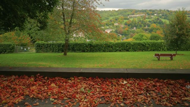 A jib shot featuring a picturesque autumn panoramic landscape in the city of Bath, England, UK. Bath is a city in the county of Somerset known for its thermal spa complex built during Roman time
