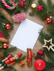 Christmas New year festive frame with winter holiday decoration on the wooden background. Copy space. Top view