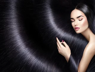 Photo sur Plexiglas Salon de coiffure Long hair background. Beauty brunette woman with straight black hair