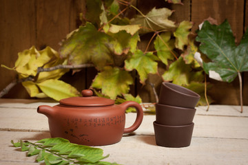 Chinese teapot of Yixing clay with autumn leaves