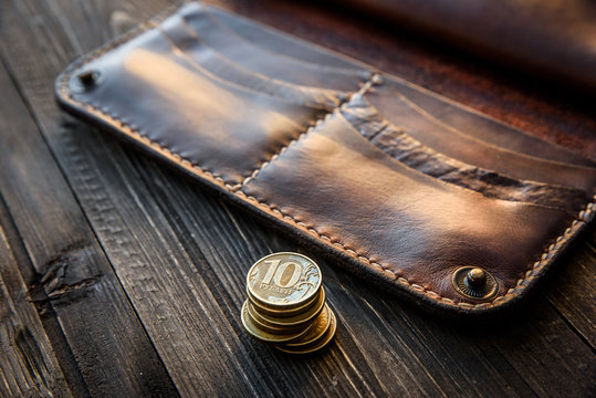 men's wallet money in cash wooden white vintage background