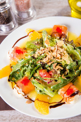 salad with red fish and orange