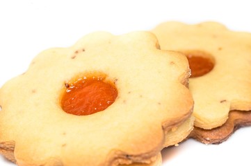 Isolated homemade apricot jam Linzer close up