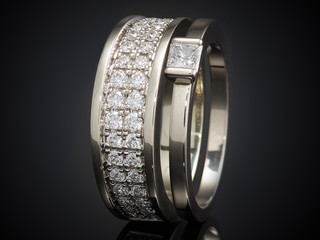 silver ring with gemstone isolated on black background