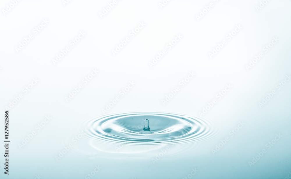 Canvas Prints water drop falling and drips on water mirror. water drop splash and make perfect circles on water su