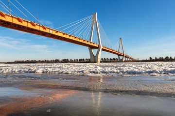 modern bridge over the frozen river