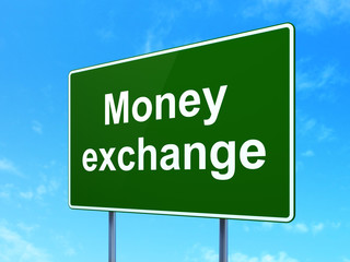 Banking concept: Money Exchange on road sign background