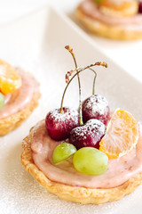 Fruit mini tarts with cherry