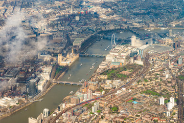 London, England  from above with the Thames, Houses of Parliament, London Eye, Waterloo and Charing Cross stations.