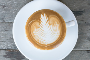 Coffee Cup on Wood Background
