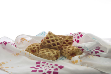 biscuits on the tablecloth and white background