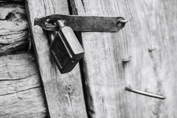padlock on the old wooden door