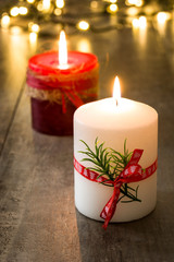 Obraz na płótnie Canvas Red and white Christmas candle and Christmas light 