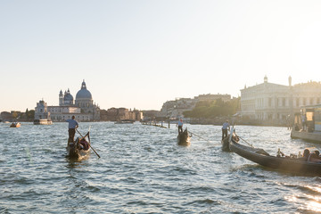 Gondolas on the grand canal at sunset, Venice, Italy