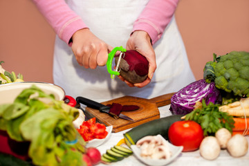 Slicing of beetroot with vegetable peeler