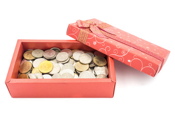 Open gift box with coins on the white background