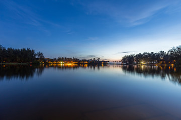 Reflection of resort house on the lake in Phuket island, Thailand. 