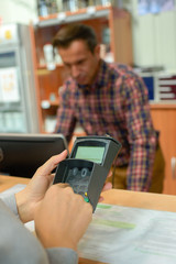 Customer entering code for card payment