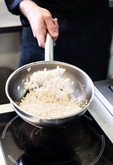 chef making risotto