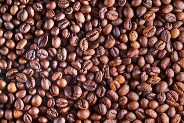 aromatic roasted coffe beans background, pattern