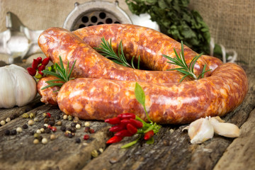 Raw sausages with rosemary and peppercorn